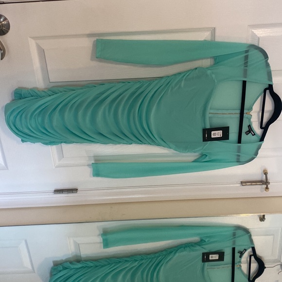 Blue going out dress. Mesh top. Never worn. Size medium - Picture 2 of 3